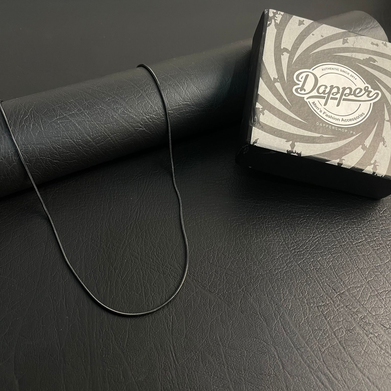 1mm sleek black round snake herringbone neck chain for men in Pakistan