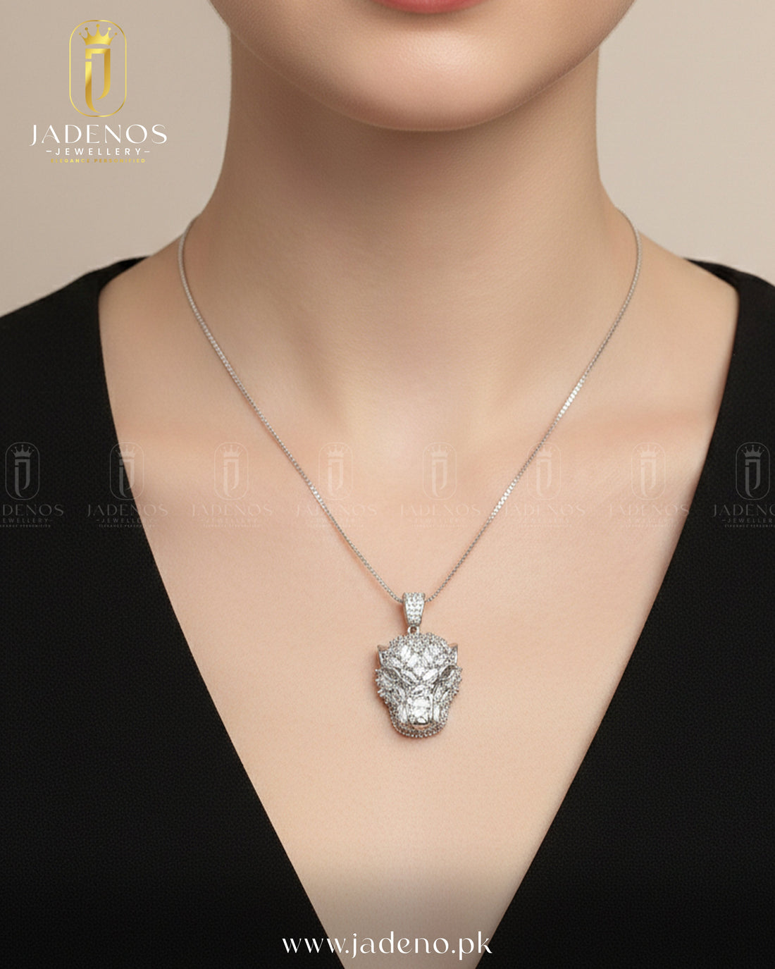 Close-up of model wearing The Imperial Lioness Pendant Set, featuring a lion head pendant with shimmering stones on a sleek chain.