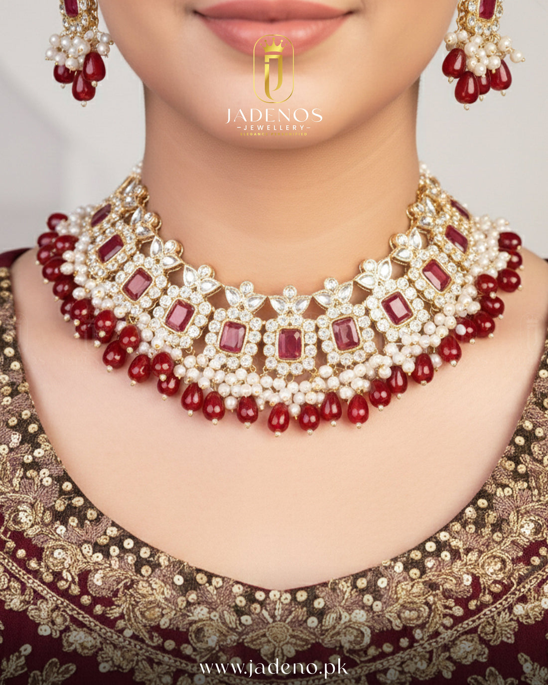 Bridal model wearing Sultana Edit choker set with tika, gold choker necklace with red stones and pearl drops.