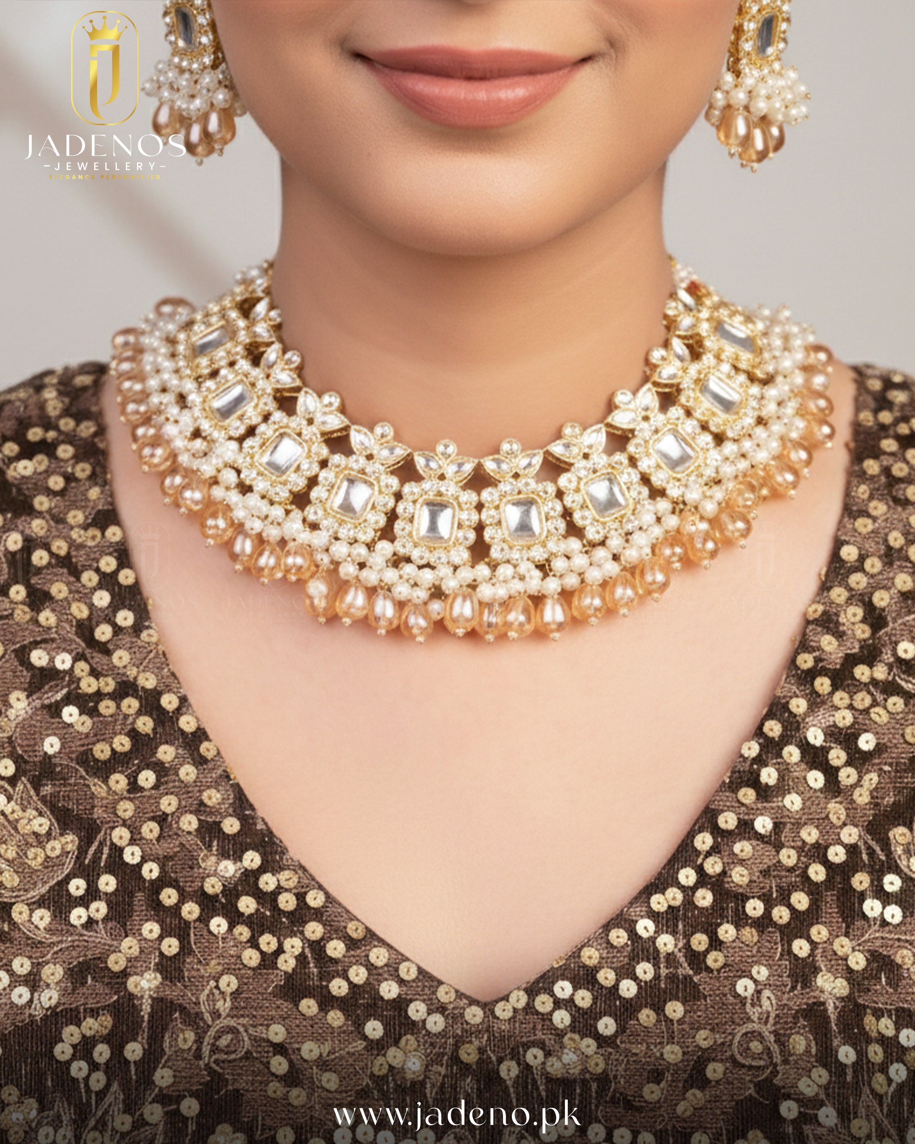 Close-up of woman wearing gold choker necklace with pearl clusters and stone detailing.