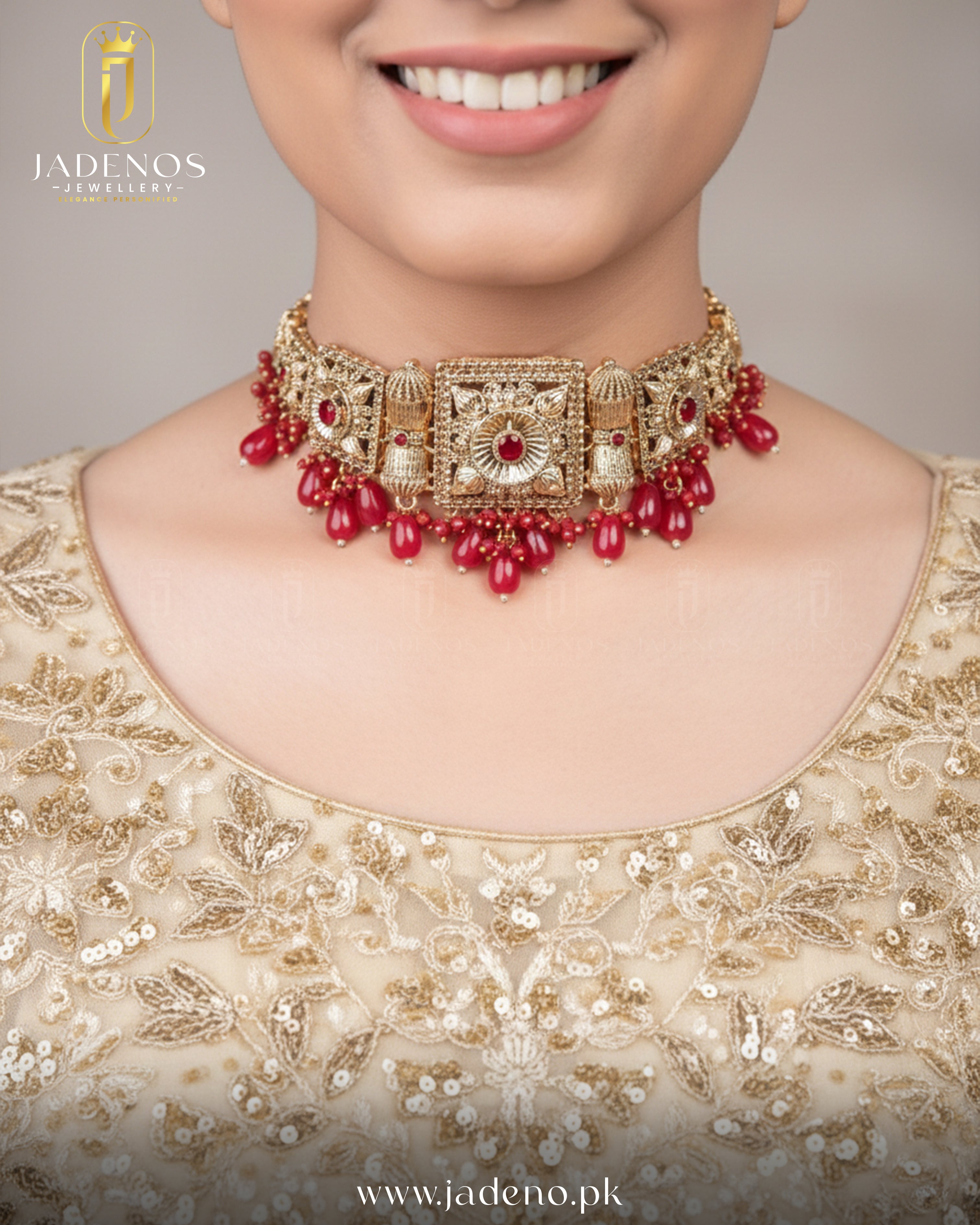 Statement look featuring Noor-e-Ronaq choker set with tika, gold choker with red stones and bead drops.